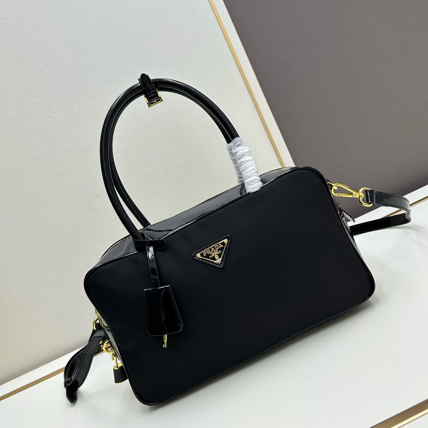 Pra*a top handle bags